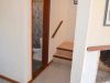 A escalera y baño