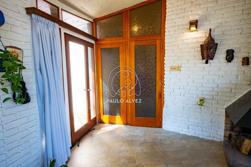 Acceso por puerta ventana a jardín 
