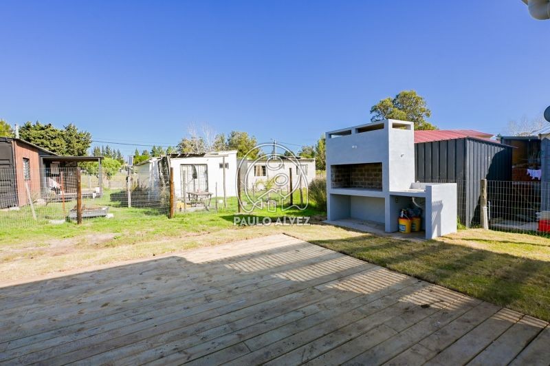 Jardín con parrillero 