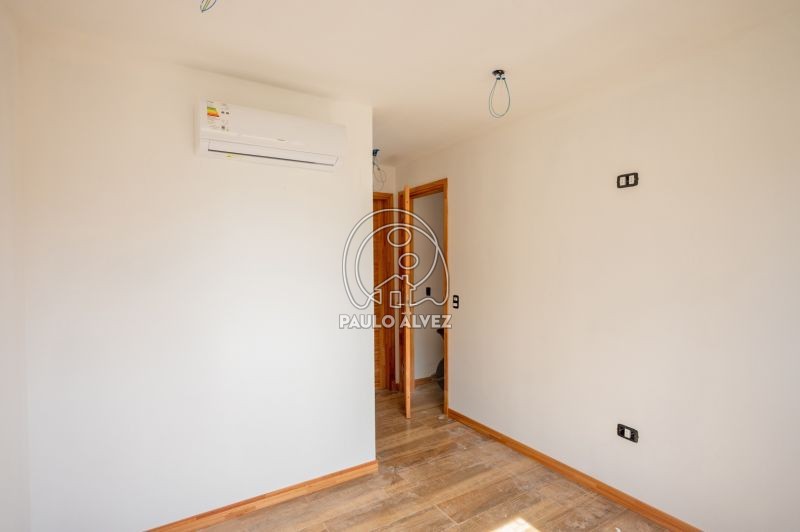 Dormitorio con vestidor